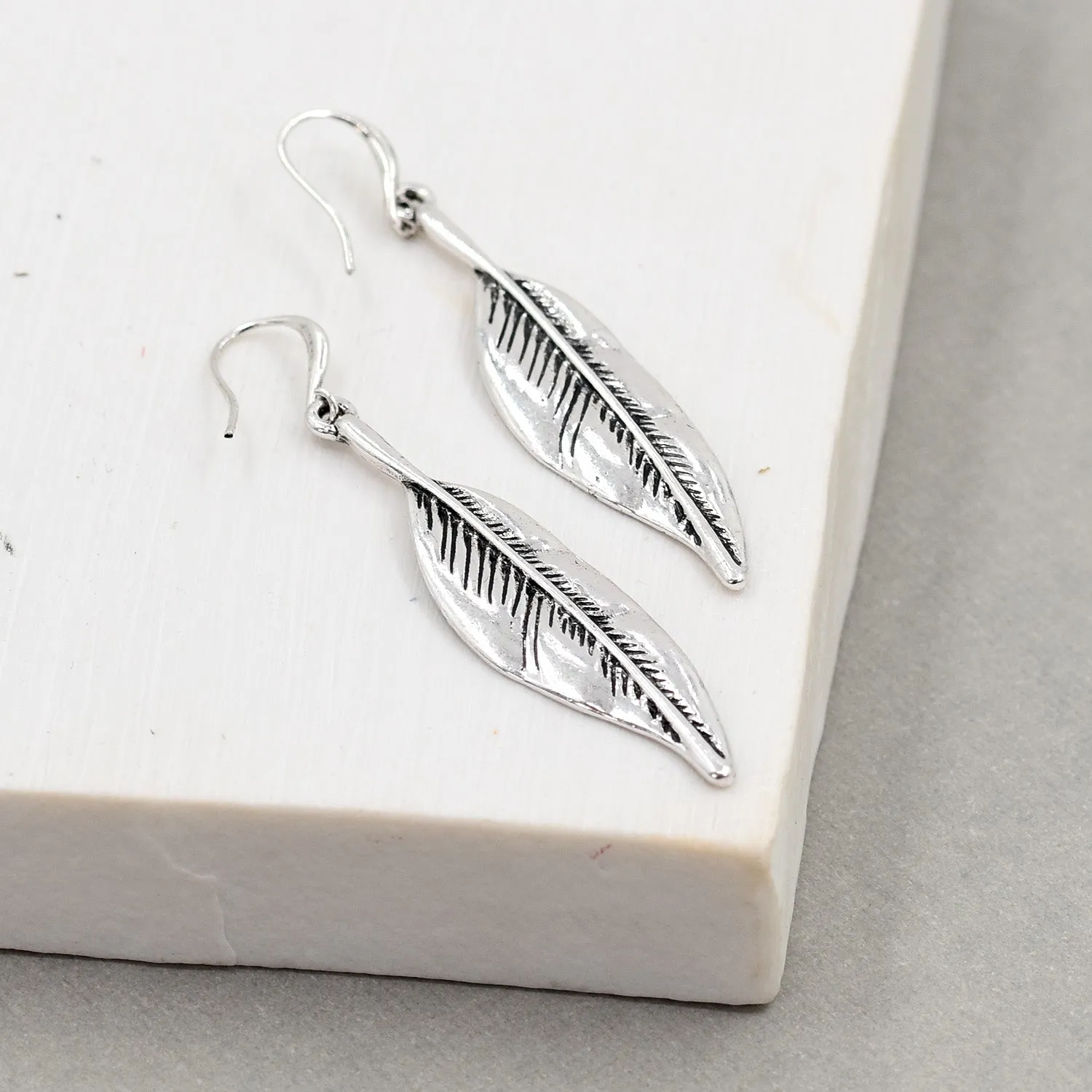 Feather motif drop earrings